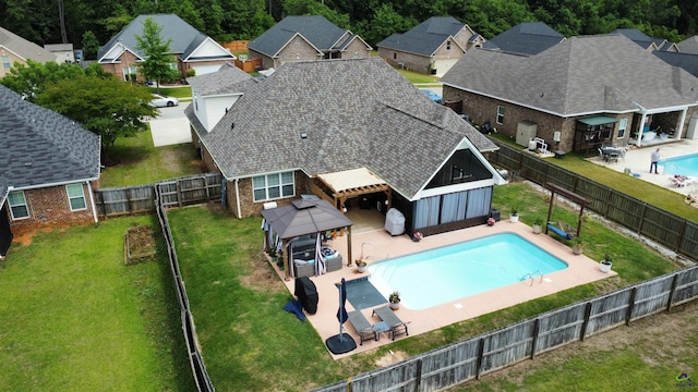 view of pool featuring a gazebo, a patio area, and a residential view