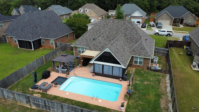 view of pool featuring a gazebo, a residential view, and a patio