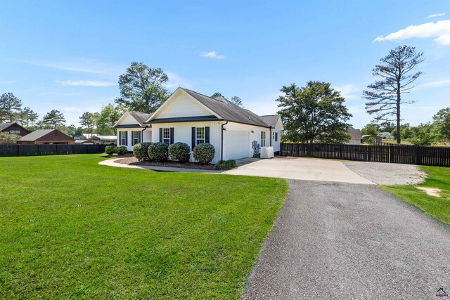 465 Pitts Rd, Hawkinsville, GA 31036 - view of front of house with driveway and an attached garage
