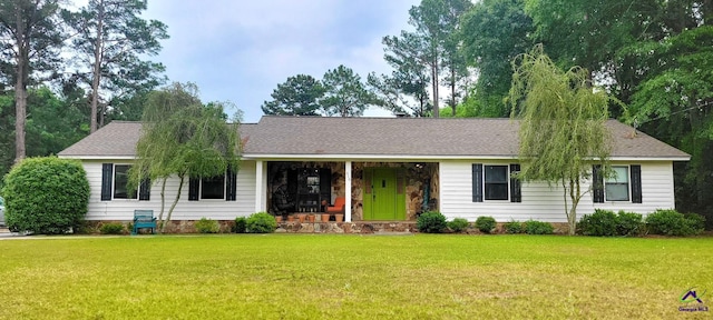 single story home featuring a front yard, a porch, and roof with shingles