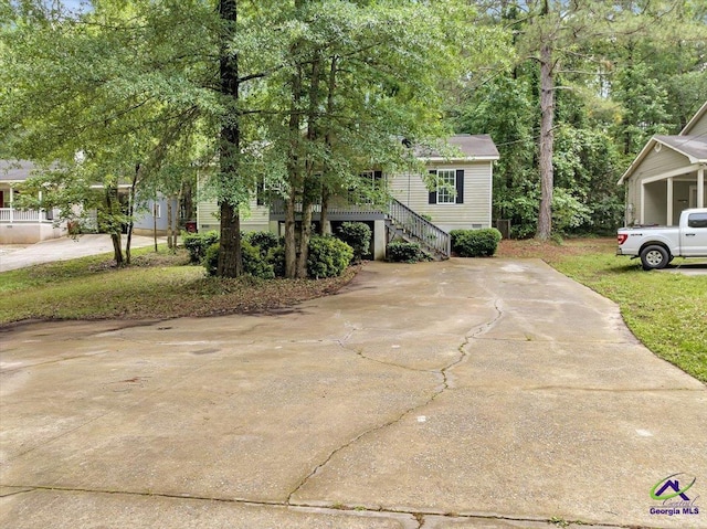 view of home's exterior with stairway