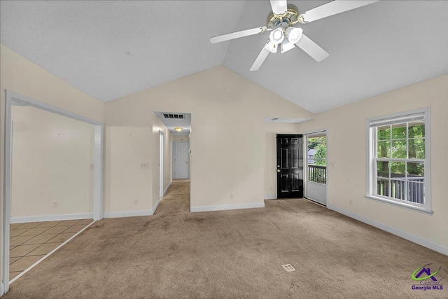 unfurnished bedroom featuring carpet floors, baseboards, access to exterior, a ceiling fan, and high vaulted ceiling