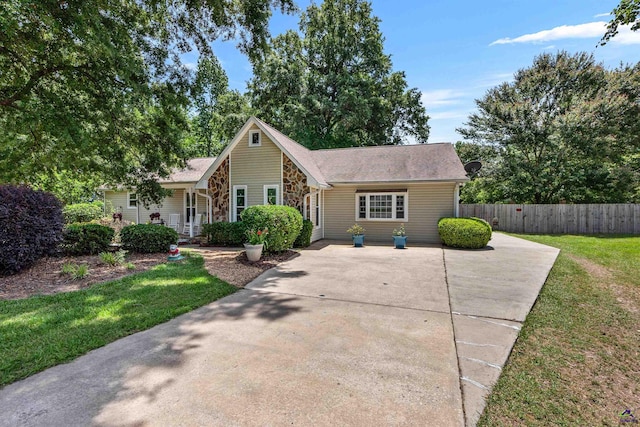 view of front of home featuring stone siding