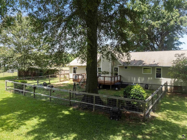 back of property featuring a deck