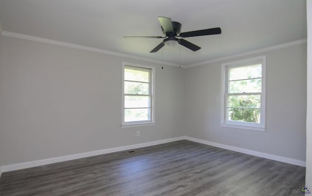 110 Wimberly Rd, Hawkinsville, GA 31036 - unfurnished room with crown molding, baseboards, dark wood-style flooring, and a ceiling fan