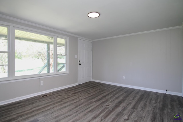118 Wimberly Rd, Hawkinsville, GA 31036 - spare room with dark wood-style floors, ornamental molding, and baseboards