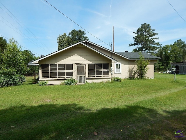 7085 US Highway 341 S, Roberta, GA 31078 - rear view of property featuring a sunroom and a yard