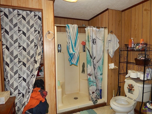 7085 US Highway 341 S, Roberta, GA 31078 - full bath featuring wood walls, a stall shower, crown molding, a textured ceiling, and toilet