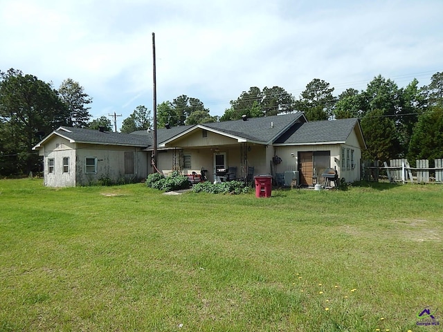 7085 US Highway 341 S, Roberta, GA 31078 - rear view of house featuring a lawn, central AC unit, and a patio area