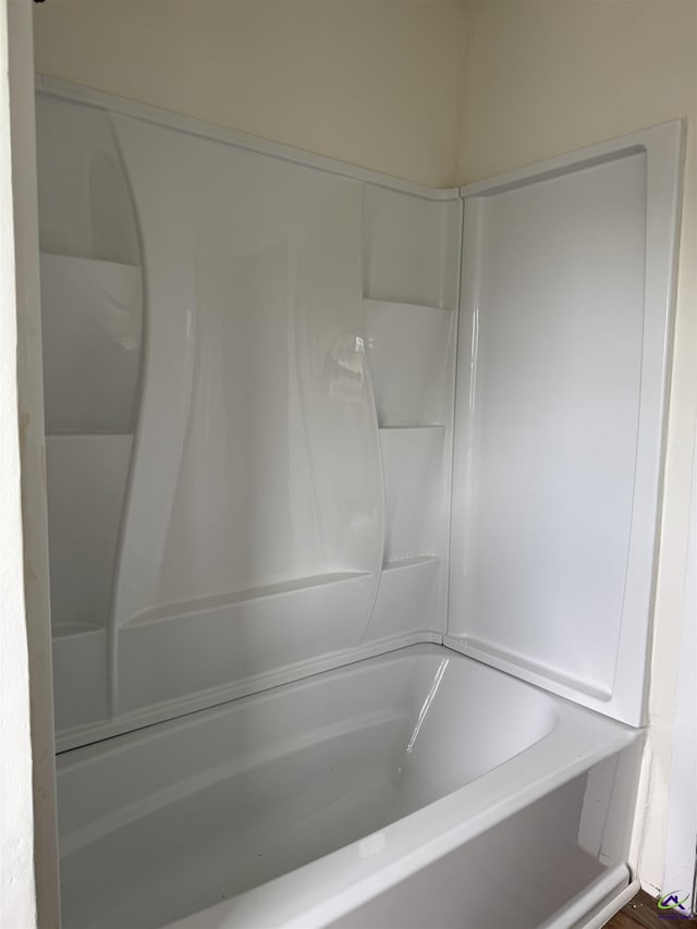 full bath with a bath
