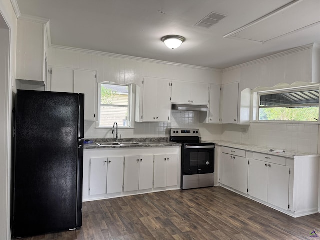 kitchen with freestanding refrigerator, stainless steel electric range, a sink, ornamental molding, and tasteful backsplash
