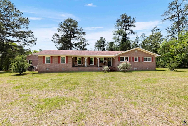 single story home with crawl space, brick siding, and a front lawn