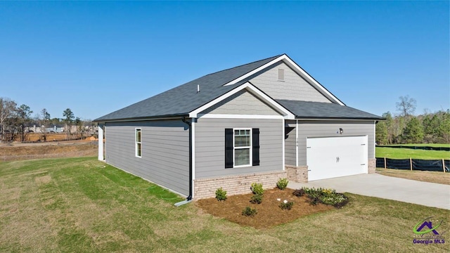 view of front of home featuring concrete driveway and a garage