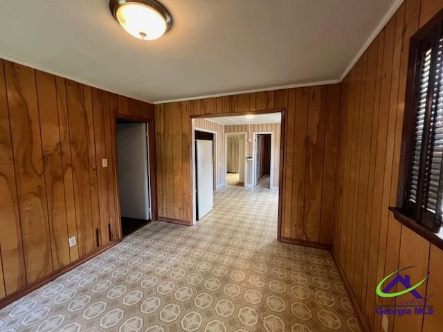 726 Mcarthur Blvd, Warner Robins, GA 31093 - spare room featuring wood walls and baseboards