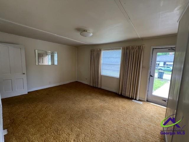 726 Mcarthur Blvd, Warner Robins, GA 31093 - spare room featuring carpet and baseboards