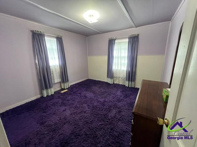 726 Mcarthur Blvd, Warner Robins, GA 31093 - empty room featuring dark colored carpet