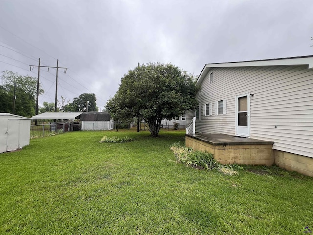 726 Mcarthur Blvd, Warner Robins, GA 31093 - view of yard with a storage shed, an outdoor structure, and a detached carport