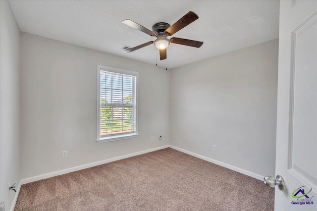 212 Raleigh Dr, Warner Robins, GA 31088 - spare room featuring carpet, ceiling fan, and baseboards