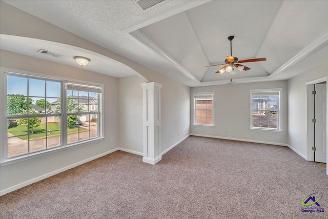 212 Raleigh Dr, Warner Robins, GA 31088 - unfurnished room featuring ceiling fan, a tray ceiling, carpet flooring, and arched walkways