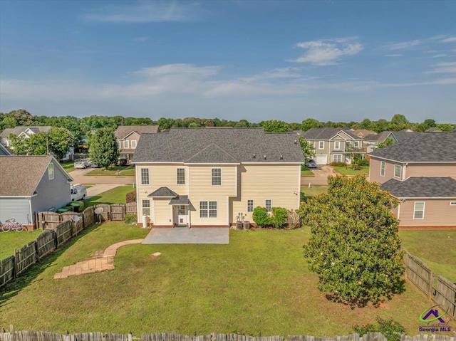 212 Raleigh Dr, Warner Robins, GA 31088 - rear view of property featuring a residential view and a patio