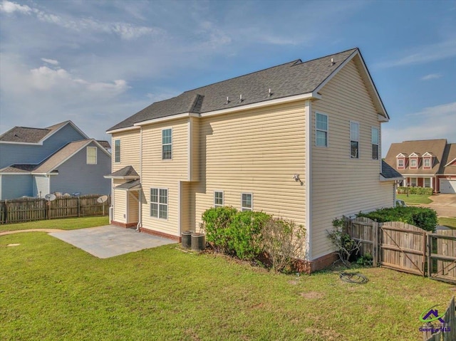 212 Raleigh Dr, Warner Robins, GA 31088 - rear view of house featuring a patio, a gate, and central air condition unit