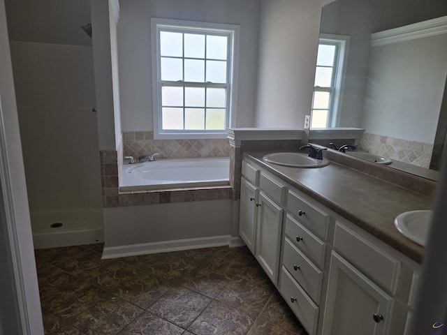 212 Raleigh Dr, Warner Robins, GA 31088 - bathroom with double vanity, a walk in shower, and a bath