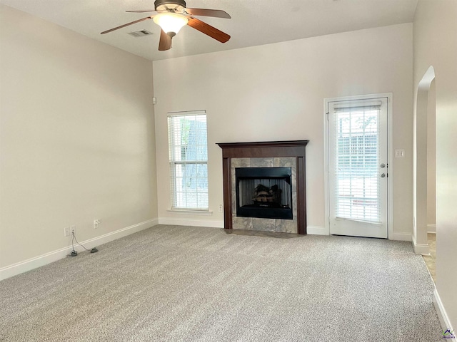 1187 Camden Ct, Warner Robins, GA 31088 - unfurnished living room with light colored carpet, a ceiling fan, and baseboards