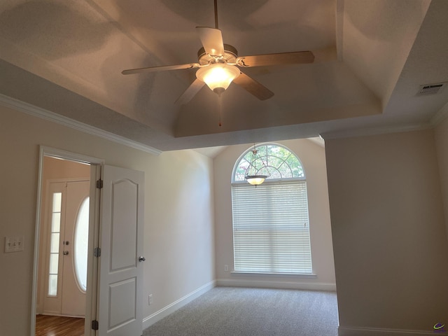 1187 Camden Ct, Warner Robins, GA 31088 - carpeted entryway featuring ceiling fan, baseboards, and ornamental molding