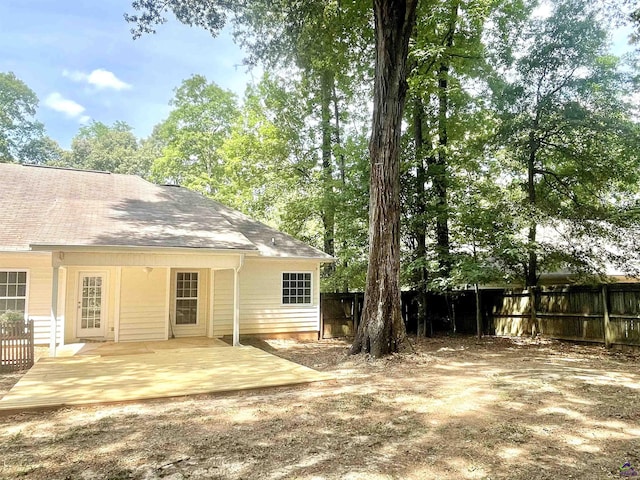 1187 Camden Ct, Warner Robins, GA 31088 - rear view of property featuring fence and roof with shingles