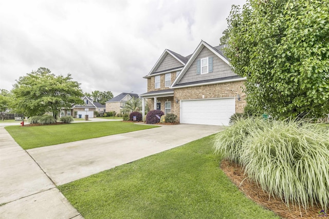 craftsman-style home with concrete driveway, brick siding, a front yard, and a garage