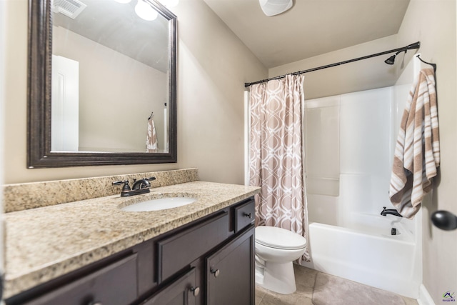 bathroom featuring vanity, toilet, and shower / tub combo with curtain