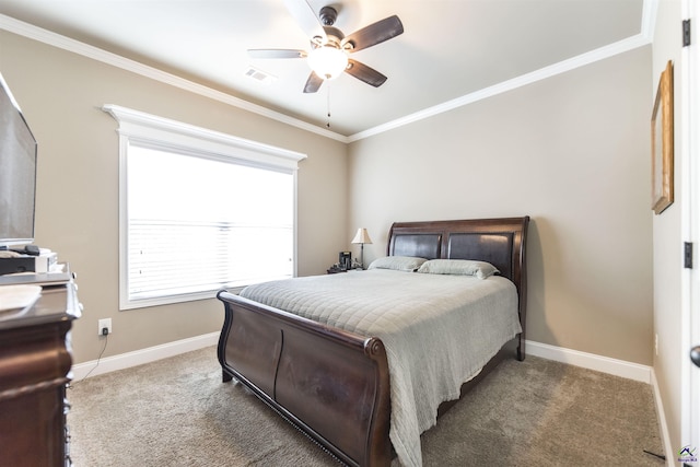 bedroom with carpet, baseboards, crown molding, and a ceiling fan