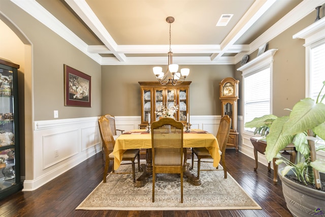 dining area featuring a chandelier, coffered ceiling, plenty of natural light, arched walkways, and dark wood-type flooring