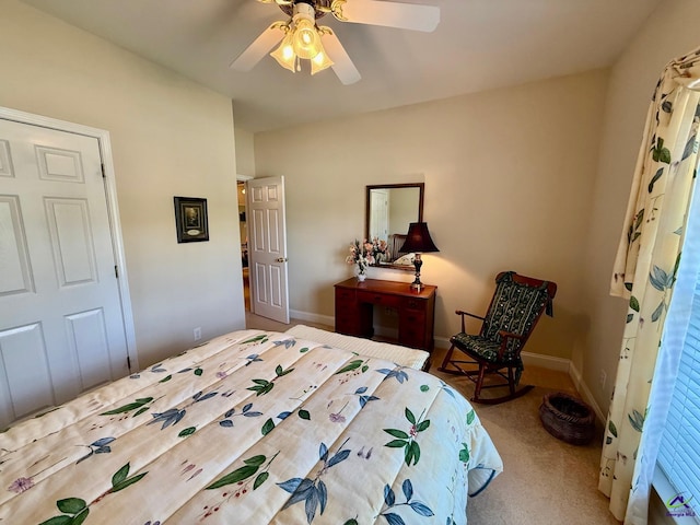 bedroom featuring carpet, a ceiling fan, and baseboards