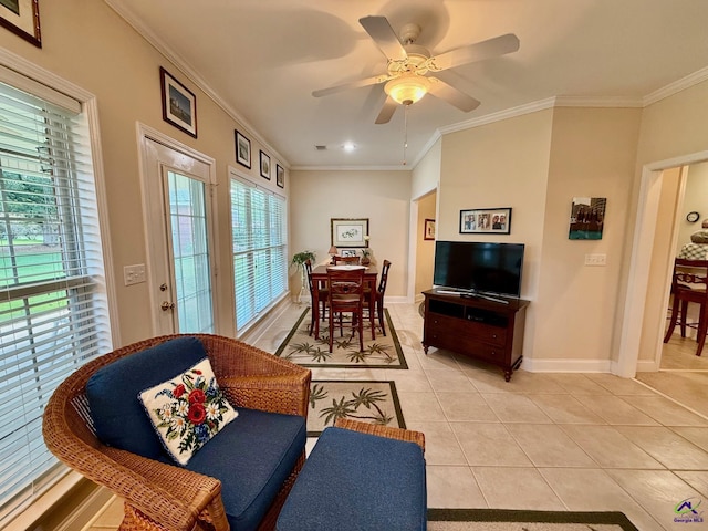 living area featuring light tile patterned floors, baseboards, crown molding, a ceiling fan, and recessed lighting