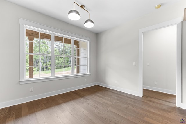 615 Head Rd, Juliette, GA 31046 - spare room featuring wood finished floors and a smoke detector