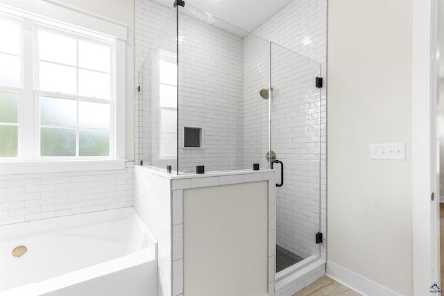 615 Head Rd, Juliette, GA 31046 - bathroom featuring a bath and a shower stall