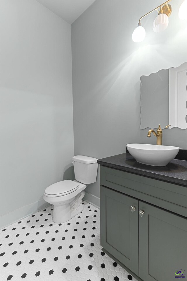 615 Head Rd, Juliette, GA 31046 - bathroom with baseboards and vanity