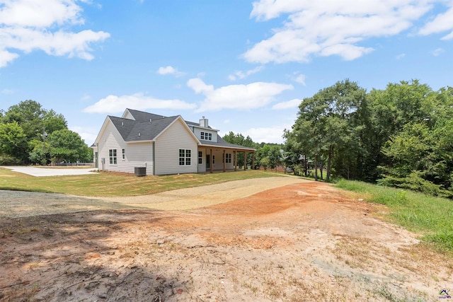 615 Head Rd, Juliette, GA 31046 - view of home's exterior with a central AC unit and covered porch