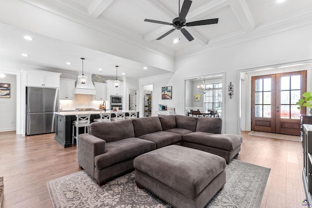 living area featuring coffered ceiling, recessed lighting, a ceiling fan, french doors, and beamed ceiling