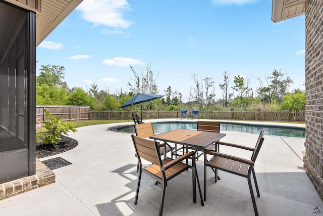 view of patio / terrace with a fenced backyard and outdoor dining area