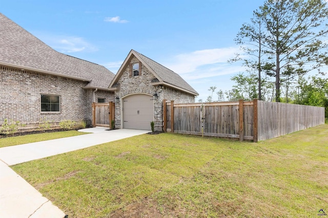 view of front facade featuring a shingled roof, concrete driveway, and brick siding