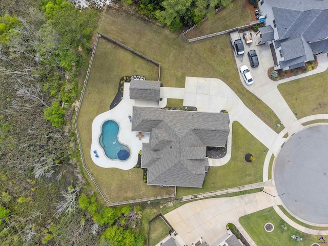 aerial overview of property's location featuring a pool