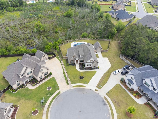 aerial overview of property's location with nearby suburban area