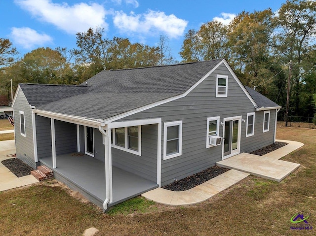 257 Macon Rd, Reynolds, GA 31076 - back of property with a patio, a shingled roof, a lawn, and cooling unit