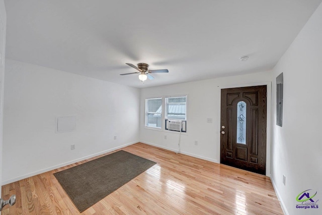 257 Macon Rd, Reynolds, GA 31076 - foyer entrance featuring light wood finished floors, a ceiling fan, baseboards, and cooling unit
