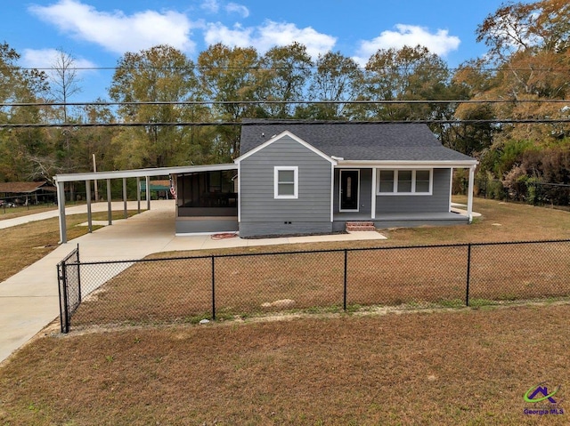 257 Macon Rd, Reynolds, GA 31076 - single story home featuring covered porch, an attached carport, and concrete driveway