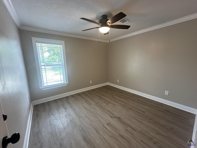 103 Ridley Ct, Warner Robins, GA 31088 - empty room featuring dark wood finished floors, a ceiling fan, crown molding, a textured ceiling, and baseboards