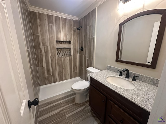 103 Ridley Ct, Warner Robins, GA 31088 - bathroom with toilet, tiled shower, vanity, and ornamental molding