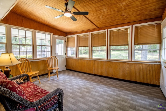sunroom / solarium with vaulted ceiling